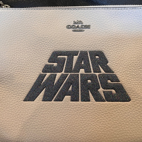 Coach Handbags - Star Wars COACH Wristlet White New Never Used